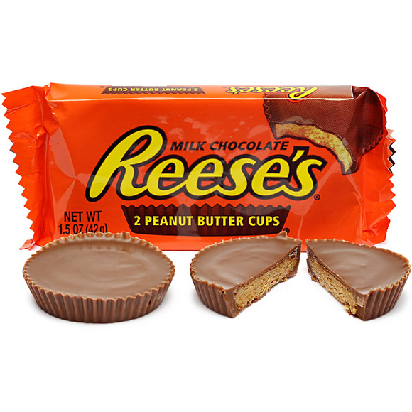This Is A Pack Of Reese's Peanut Butter Cups And A Full Peanut Butter Cup And A Peanut Butter Cup Broken In Half